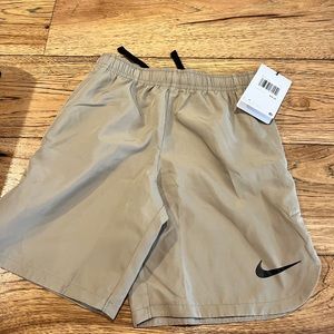 Khaki Nike shorts size 7